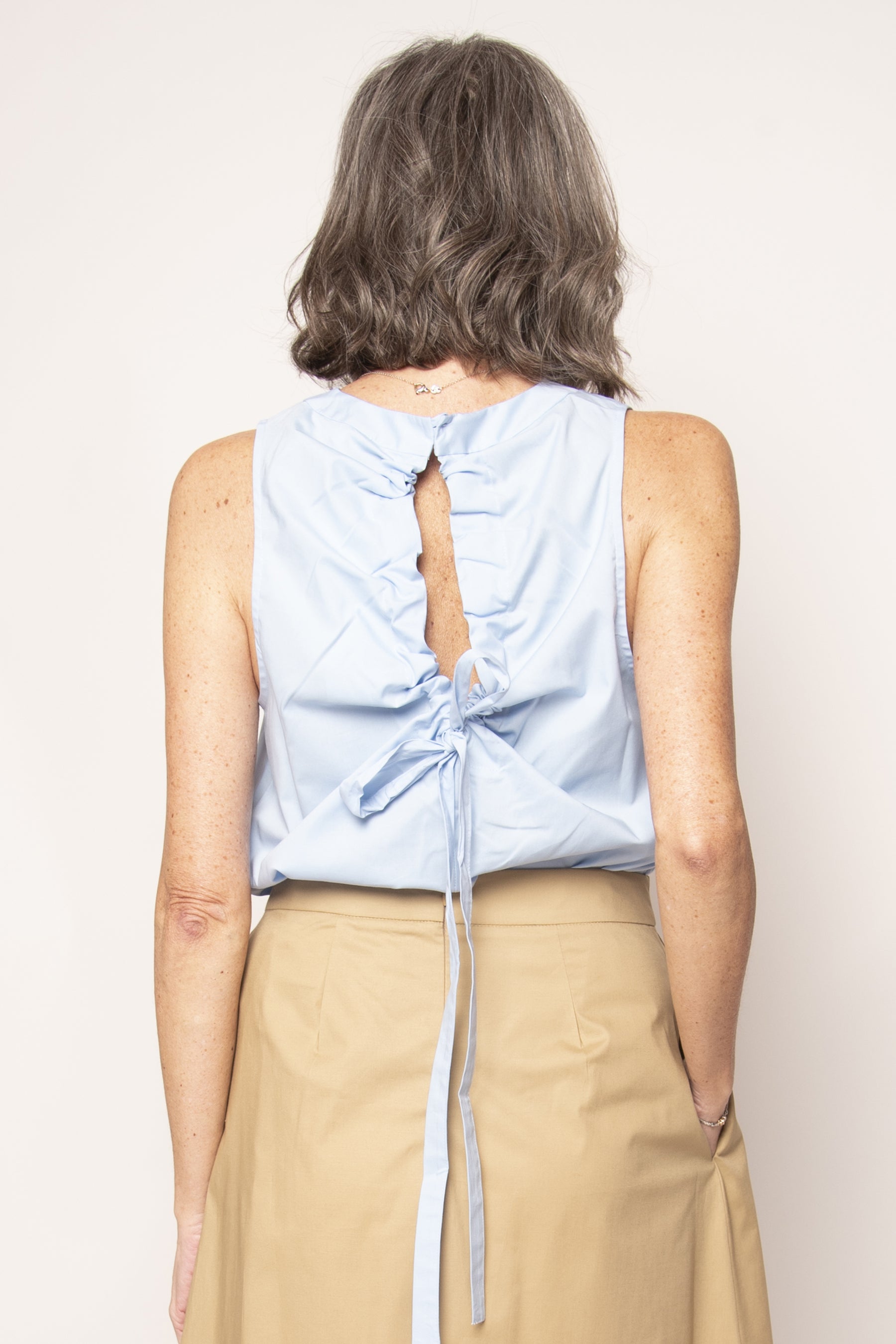 Top con coulisse e fiocco sulla schiena Eufonia